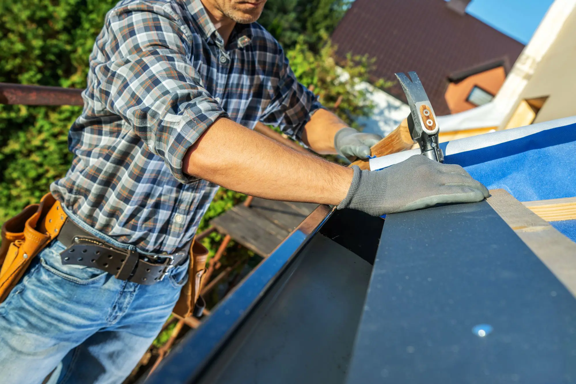 Gutter installation on residential roofline