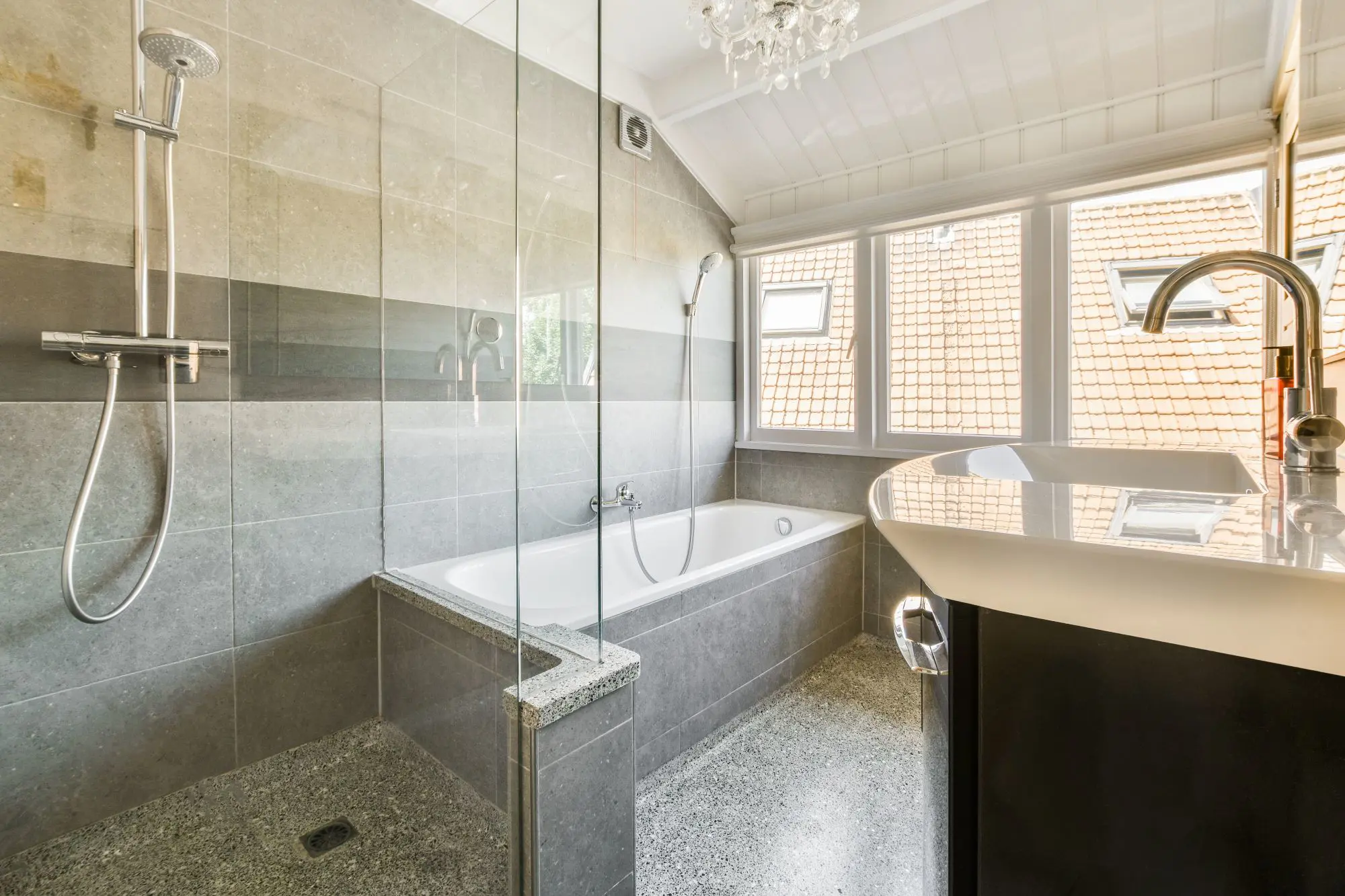 Finished bathroom remodeling project with updated vanity, flooring, and fixtures
